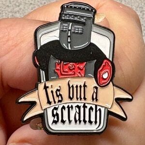 Monty Python Black and Red 'Tis But a Scratch' Enamel Pin